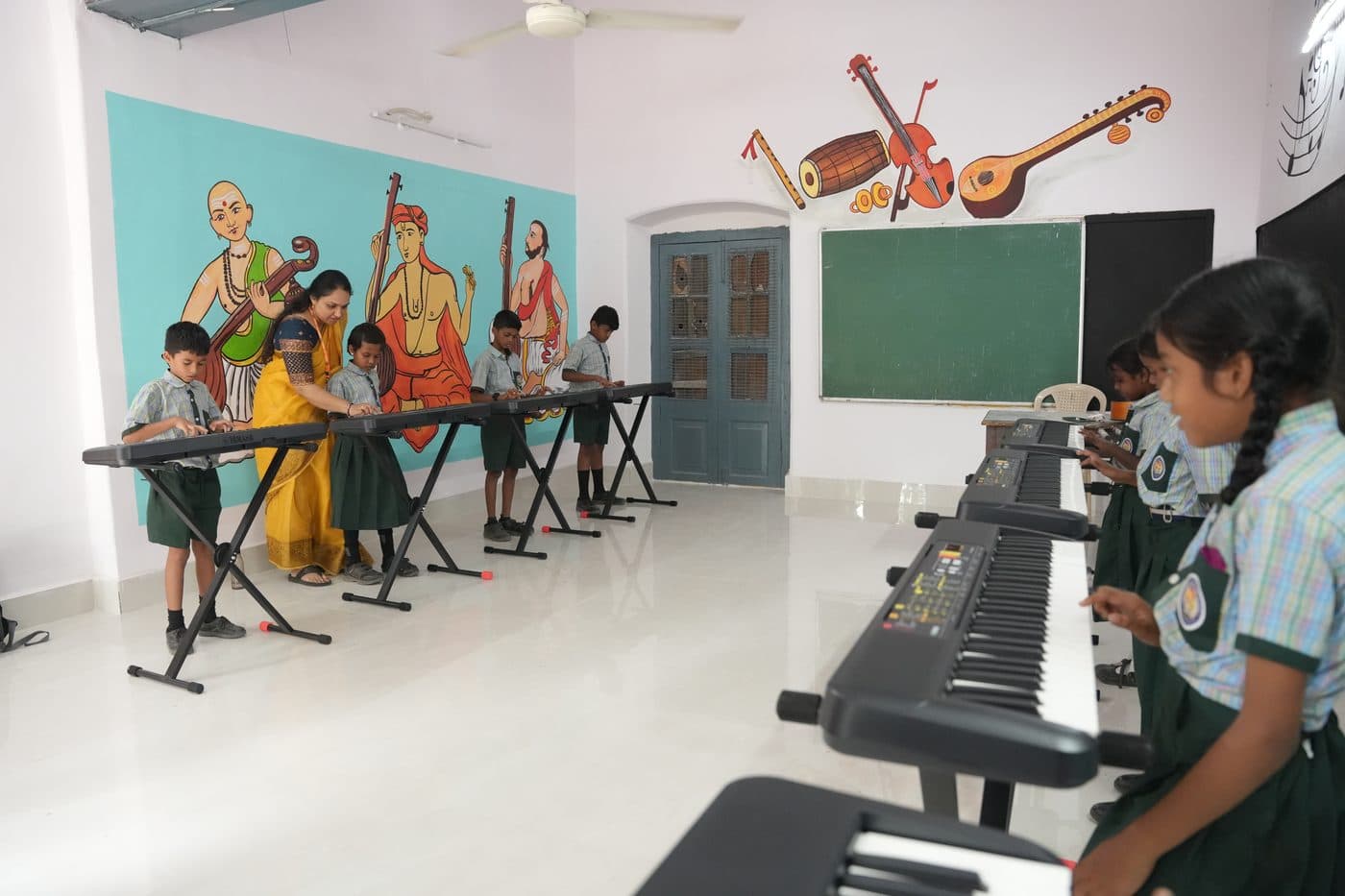 A student concentrating on the keys during keyboard practice
