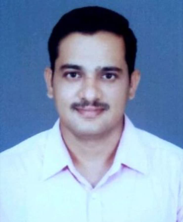 Photograph of T. Rammurthy, Mathematics & Economics teacher